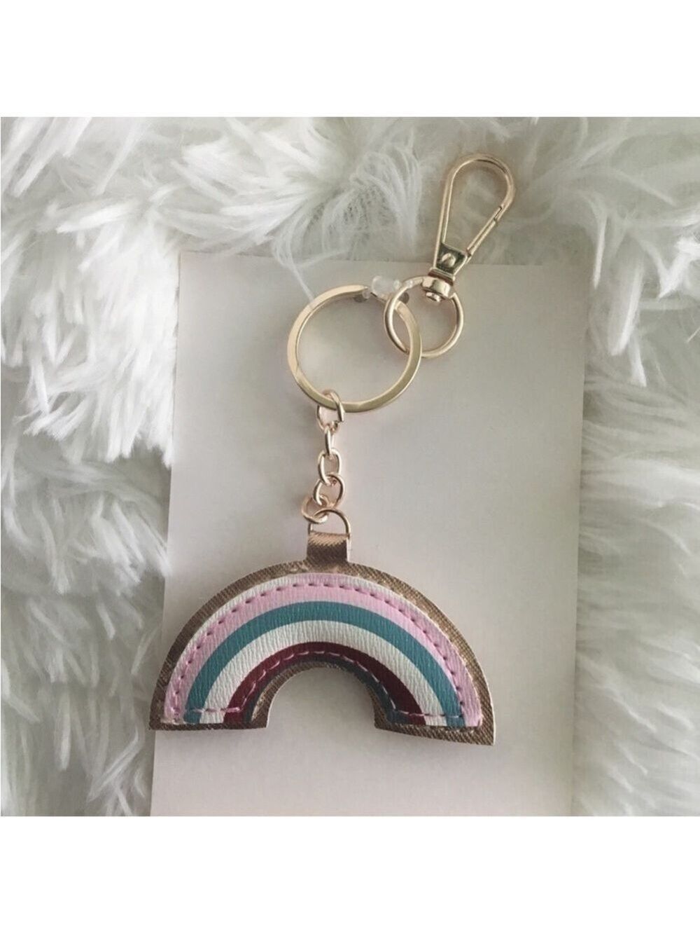 Woman’s rainbow keychain with chain and spring clip